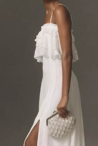 Vintage-style beaded shell-shaped wedding clutch with a kiss-lock clasp